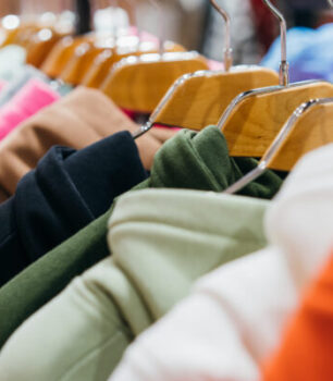 fashion clothing on hangers at the show
